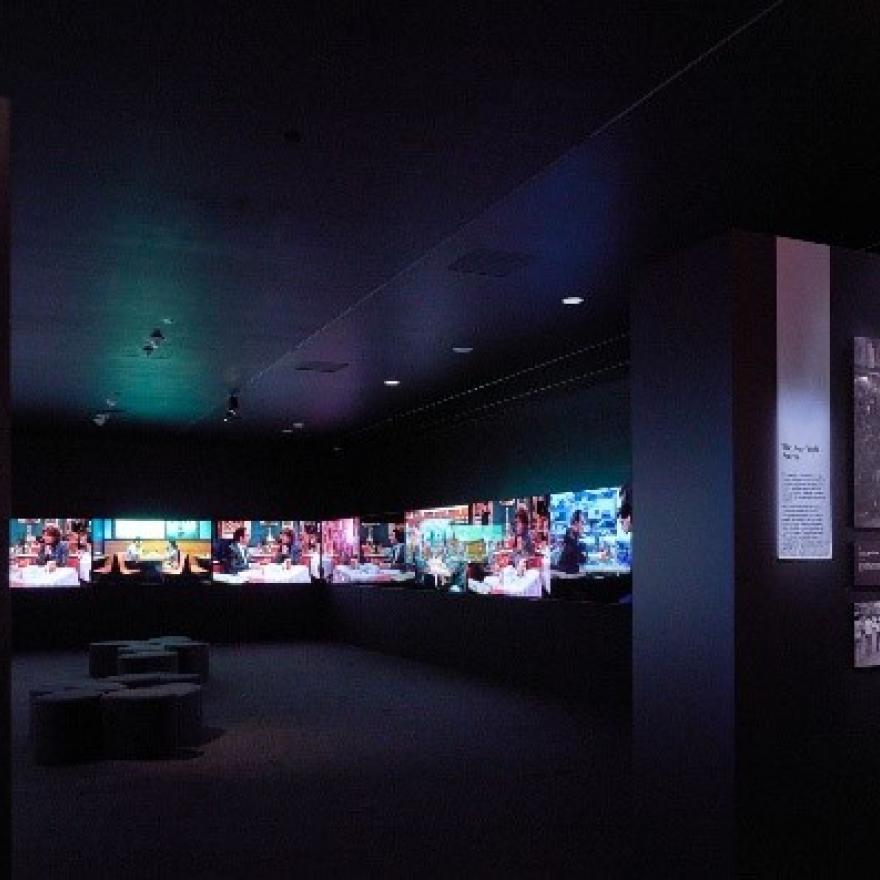 A gallery with several screens.