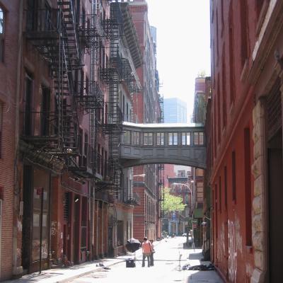 Two people in the middle of a street in Tribeca, NYC