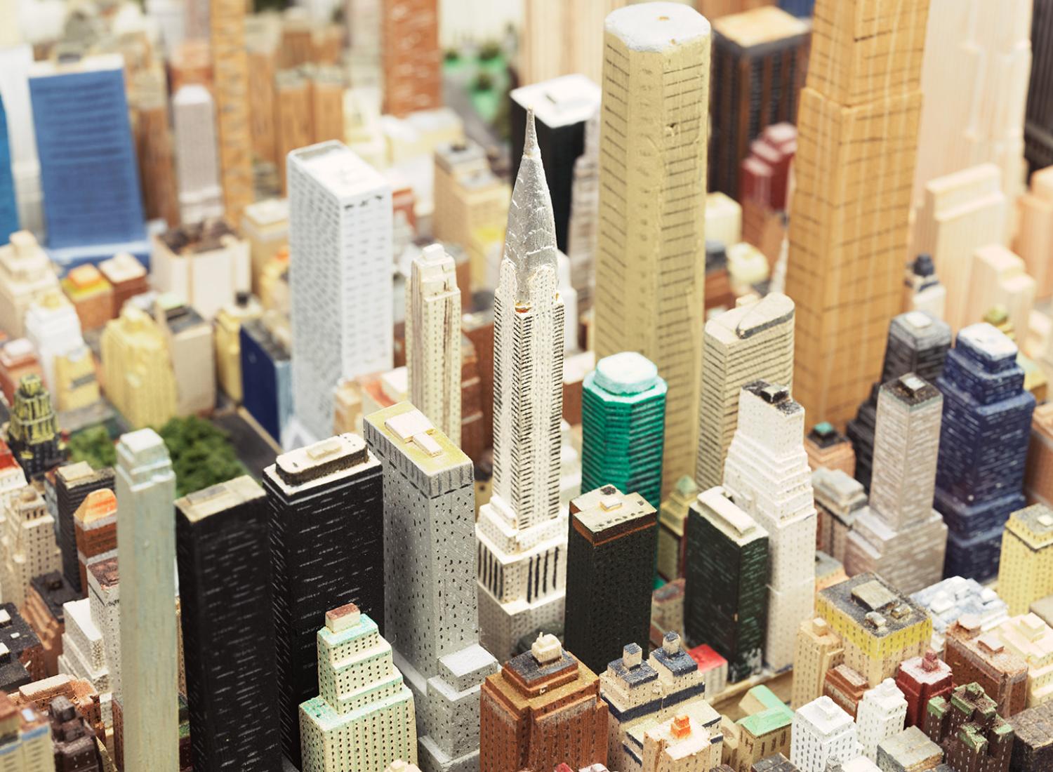 Miniature buildings from New York City carved out of wood