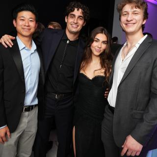 Four people posing for a photo at the 2025 Director's Circle Benefit