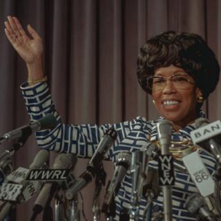 Regina King as Shirley Chisholm in the film "Shirley" waves during a press conference