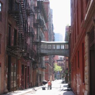 Two people in the middle of a street in Tribeca, NYC