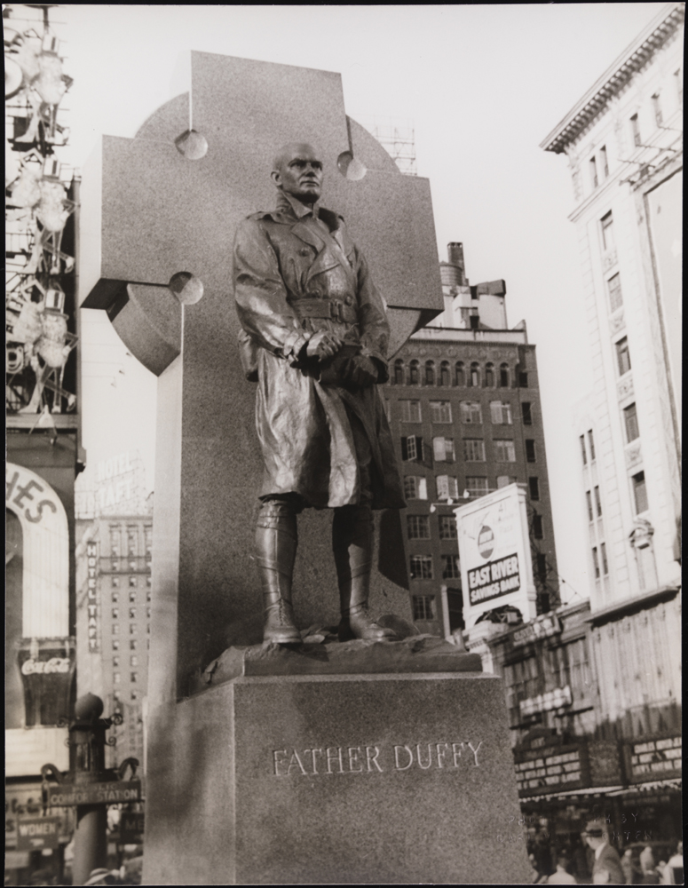 Carl Van Vechten (1880-1964). Statue of Father Duffy, Times Square, May 15, 1937. Museum of the City of New York. X2010.8.566 Image used with permission from the Van Vechten Trust